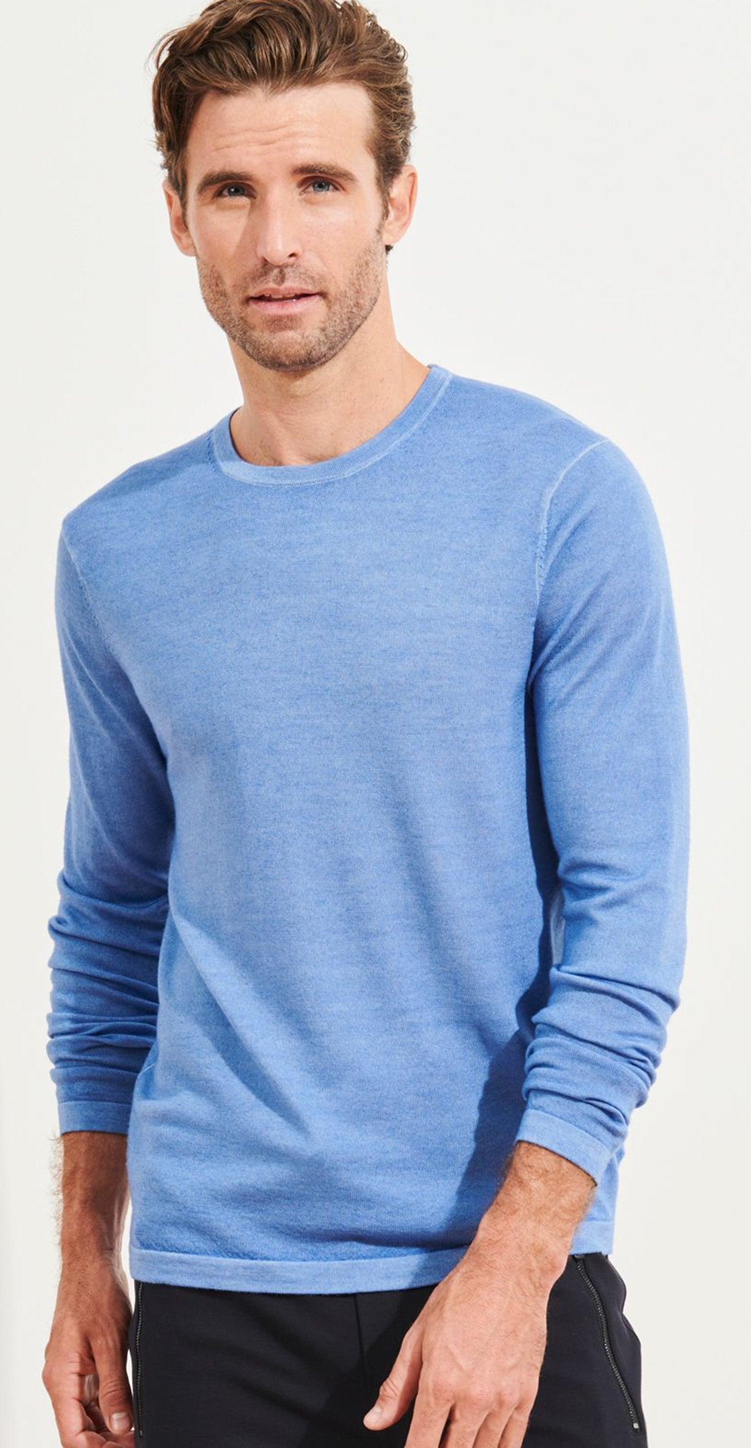 Soft washed merino wool Classic styling with contemporary distressed edges. Light weight and luxurious hand feeling. Open cuffs and waist band. Modern fit is best for slim to moderate builds.  If between sizes order up.